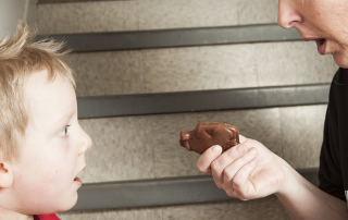 Parent rewarding child
