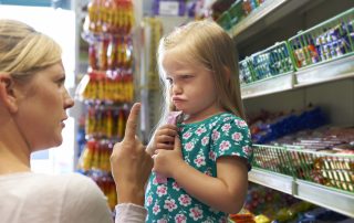 Child having tantrum in store