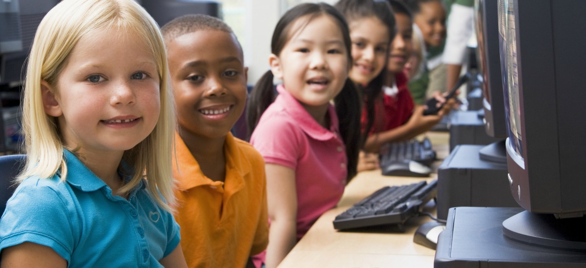 Young children at computer lab at school