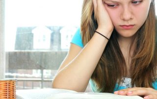 girl getting stressed about studying
