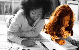 Woman drawing with small child